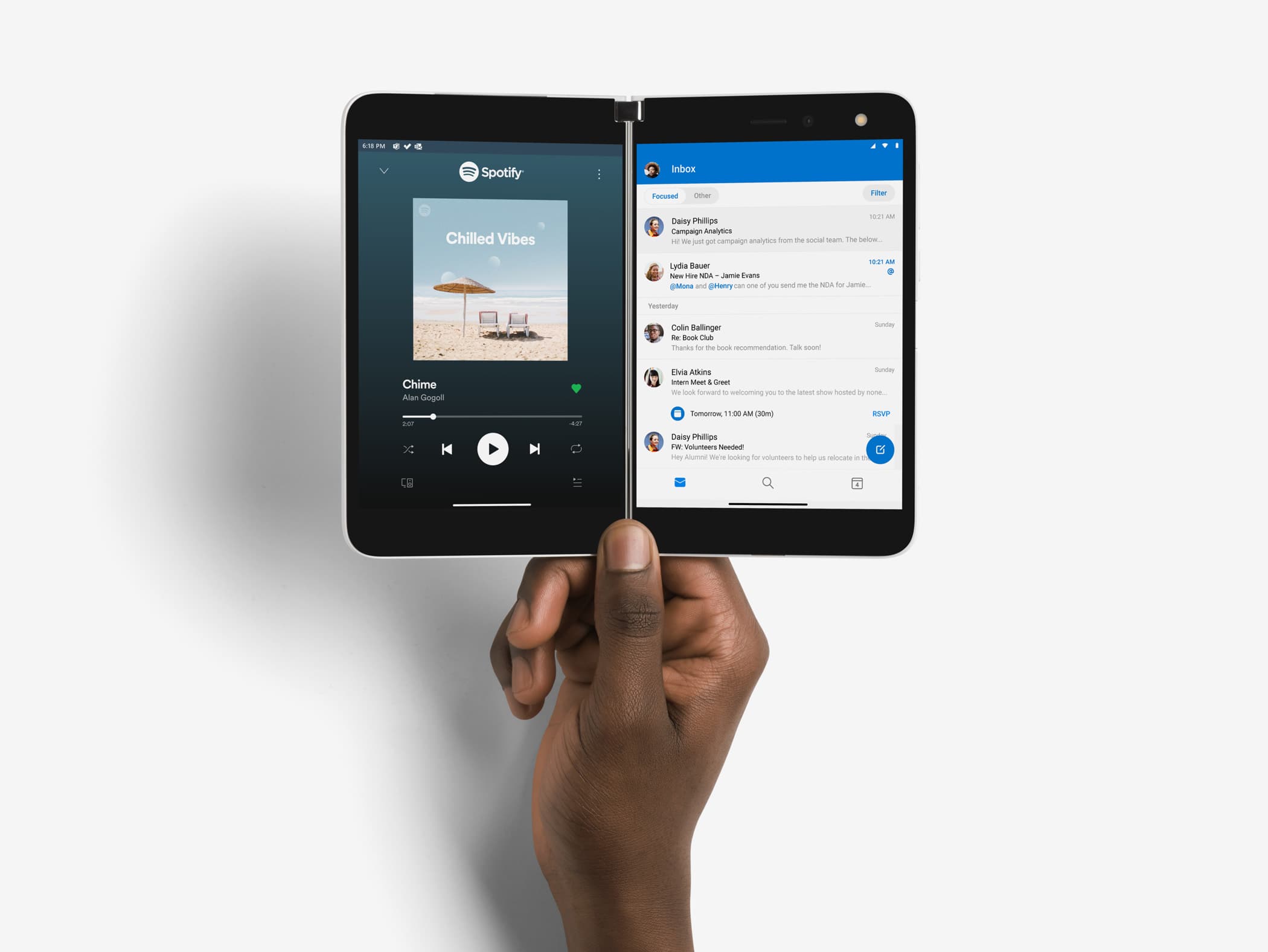 You can multitask with two apps on Surface Duo, one on each screen. Shown is Spotify and Outlook.